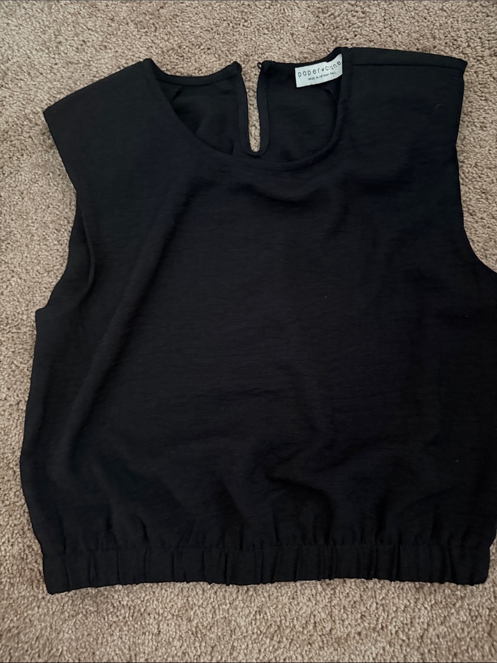 Paper Crane Black Sleeveless Elastic hem tank with shoulder pads- size small